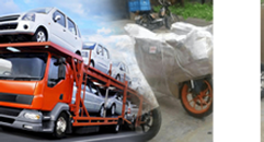 Vehicle transport truck carrying cars and bikes